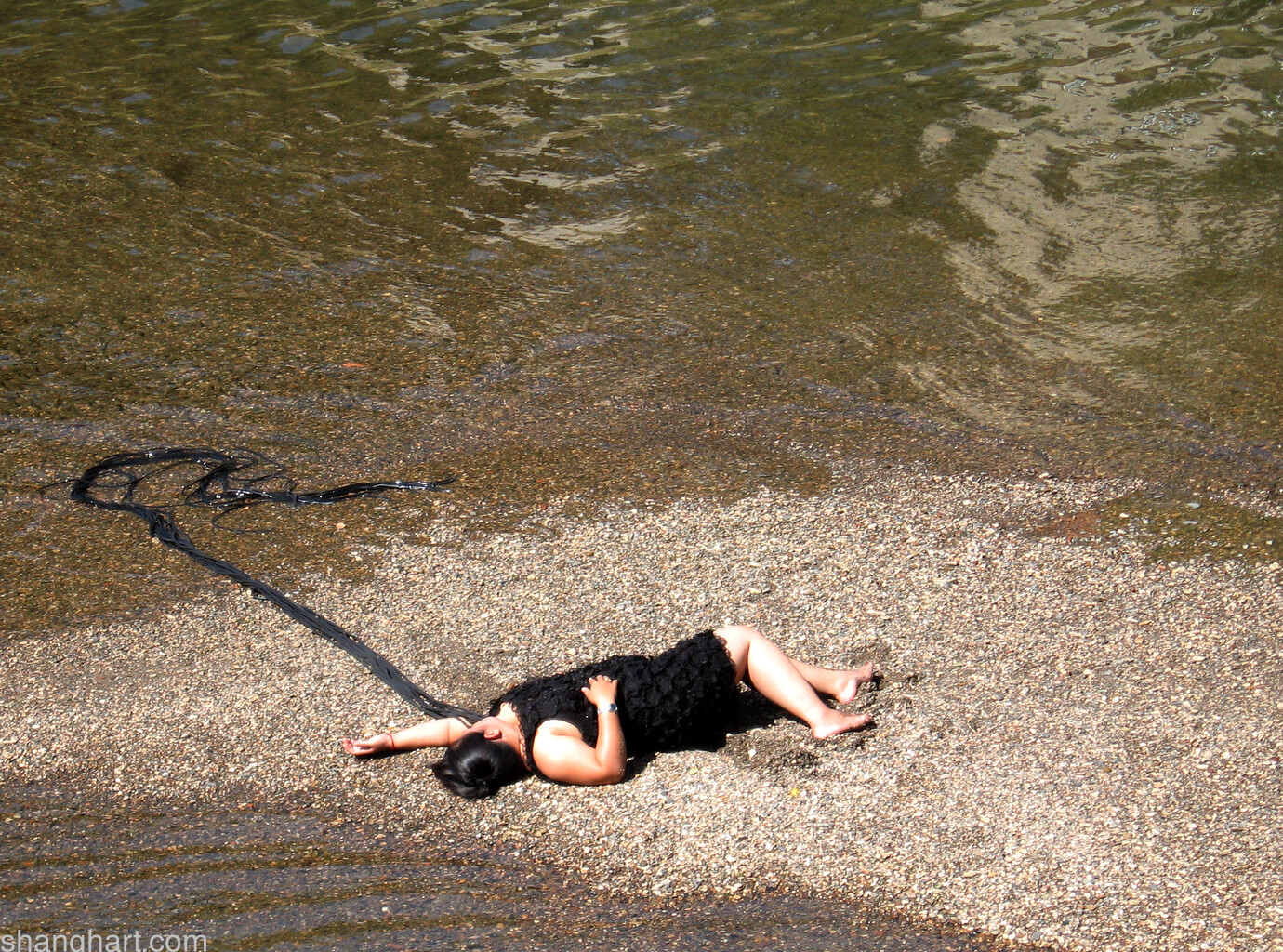 Melati Suryodarmo, I Put a Spell on You. Performed at the river in Hildesheim, 2009. Photo: boris Nieslony.