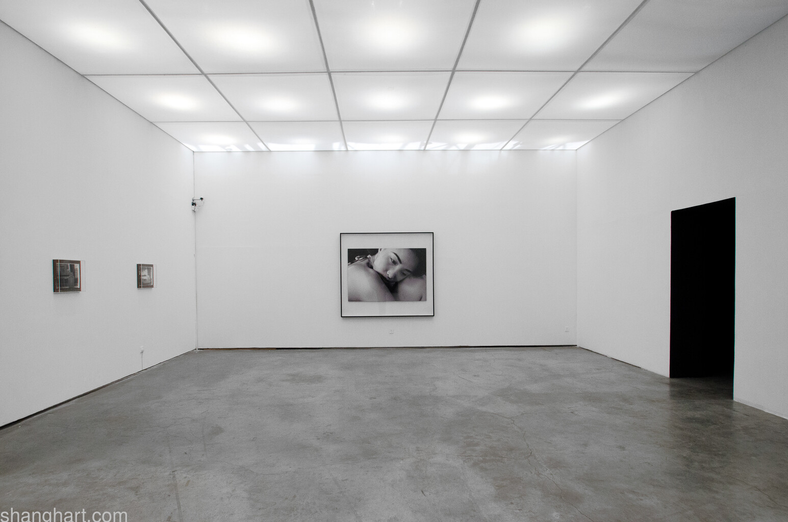 Installation View, From Left: GENG Jianyi” The Window's World” 2008, YANG Fudong” International Hotel”2010