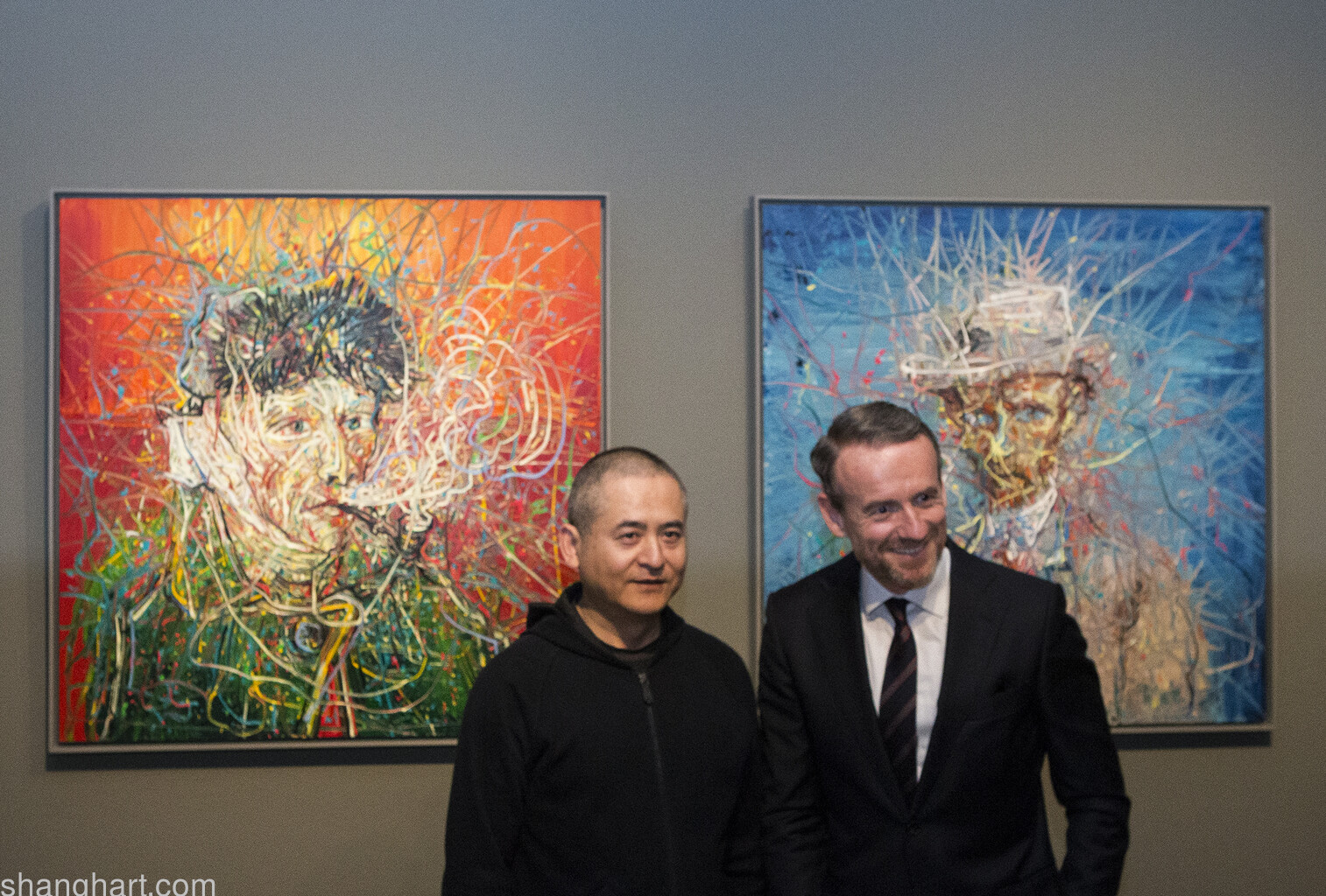 Zeng Fanzhi and Axel Rüger (Director of the Van Gogh Museum in front of Zeng’s new works)  ©Fanzhi Studio 2017